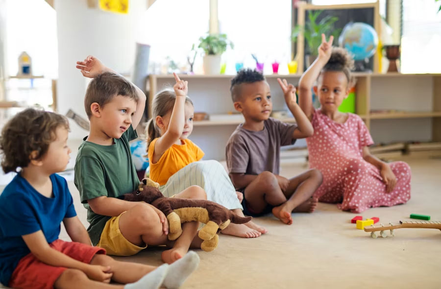 Children taking part in a classroom group activity